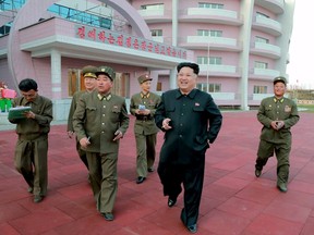 North Korean leader Kim Jong Un provides field guidance to Wonsan Baby Home and Orphanage, which is close to completion, in this photo released by North Korea's Korean Central News Agency (KCNA) on April 22, 2015. REUTERS/KCNA