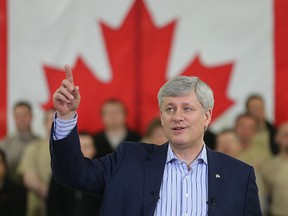 Prime Minister Stephen Harper makes a policy announcement on small businesses at F.C. WoodWorks in Winnipeg, Man. Thursday April 23, 2015.