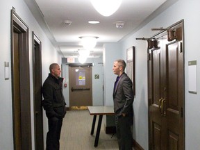 Western University Community Campus Police officers stand outside of Room 4155 where the university board of governors are holding a meeting on campus in London. The campus police were on hand to enforce a decision by the board not to allow recording devices or cameras into the meeting. (CRAIG GLOVER, The London Free Press)