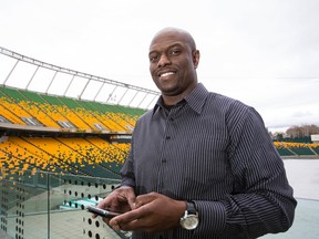 Edmonton Eskimos general manager Ed Hervey poses for a photo at Commonwealth Stadium in Edmonton, Alta., on Thursday, April 23, 2015 after a Twitter meetup with fans. Hervey has received a contract extension as general manager for the CFL football team. Ian Kucerak/Edmonton Sun/Postmedia Network