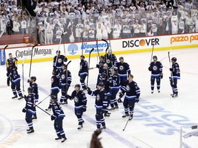 The Jets salute their fans after their season ended on home ice Wednesday.