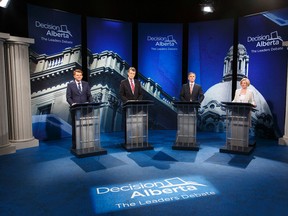 (Left to right) Wildrose Party leader Brian Jean, Alberta Liberal leader David Swann, Progressive Conservative leader Jim Prentice and Alberta NDP leader Rachel Notley are seen before the start of the Election 2015 Leaders' Debate at Global Edmonton in Edmonton, Alta., on Thursday, April 23, 2015. Ian Kucerak/Edmonton Sun/Postmedia Network