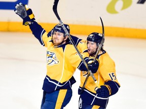 Nashville Predators centre Colin Wilson celebrates with centre Craig Smith after a goal during the third period against the Chicago Blackhawks in Game 5 of the first round of the 2015 NHL playoffs at Bridgestone Arena on April 23, 2015. (Christopher Hanewinckel/USA TODAY Sports)