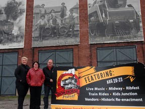 Rebekah Ryersee, left, Iron Horse Festival event coordinator, Paul Corriveau, Iron Horse Festival president and Dawn Miskelly, Elgin County Railway Museum manager, gather at the museum Thursday to announce a five-year agreement to host the popular summer festival at the downtown rail lands.