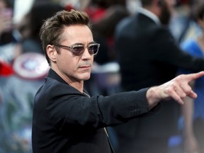 Robert Downey Jr.  poses at the European premiere of "Avengers: Age of Ultron" at Westfield shopping centre in London. (REUTERS/Stefan Wermuth)