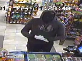 Sarnia Police released surveillance photos of an alleged robbery that happened early Friday at a Sarnia convenience store. (Handout/Sarnia Observer/Postmedia Network)