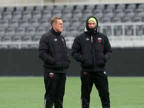 Ottawa Fury FC assistant coach Martin Nash, left, talks to Fury Academy coach Dark Buser at practice Frida, April 24,2015. Nash will assume head coaching duties for Saturday's game against Fort Lauderdale following a death in the family of head coach Marc Dos Santos.
(Chris Hofley/Ottawa Sun/Postmedia Network