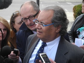 Lawyer Paul Williams talks to the media Friday afternoon after Justice Gethin Edward clarified his decision from last November regarding the rights of a Six Nations girl who refused chemotherapy.   (SUSAN GAMBLE / The Expositor/ Postmedia Network)