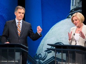 Progressive Conservative leader Jim Prentice (left) and Alberta NDP leader Rachel Notley debate during the Election 2015 Leaders' Debate at Global Edmonton in Edmonton, Alta., on Thursday, April 23, 2015. Ian Kucerak/Edmonton Sun/Postmedia Network