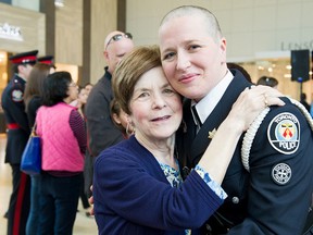 Det. Const. Amy Davey, right, with her mother Judy after her head was shaved for the Cops for Cancer event in Toronto recently. Judy Davey was diagnosed with terminal cancer last year. (Toronto Police Service)