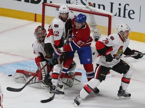 Ottawa Senators goalie Craig Anderson makes a toe save against Montreal Canadiens during second period action at the Bell  Centre in Montreal Friday April 24, 2015.  Tony Caldwell/Postmedia Network