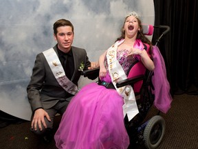 Prom King and Queen, Michael Bielen and Sammy Sands get their portrait taken at the John Paul II secondary school prom at the Marconi Club in London Friday night. (DEREK RUTTAN The London Free Press)