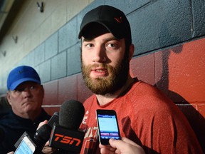 Eric Gryba scrums with media at the Canadian Tire Centre in Ottawa on Saturday, April 25, 2015. Matthew Usherwood/Ottawa Sun/Postmedia Network