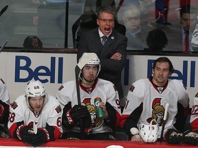 Ottawa Senators coach Dave Cameron yells at his players during third period action at the Bell  Centre in Montreal Friday April 24, 2015.  The Ottawa Senators defeated the Montreal Canadiens 5-1 Friday night in Montreal. Tony Caldwell/Postmedia Network