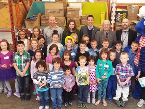 Winnipeg Harvest Kids Who Care awards were handed out to 104 children and youths who gathered food and raised funds for the food bank Saturday, April 25, 2015. Back row: Gordon Pollard, board president, Winnipeg Harvest; Mayor Bowman;Ron O'Donovan, co-founder, Kids Who Care program;  emcee Mark Morris, QX104 FM; and Lionel the Mascot, Boston Pizza.