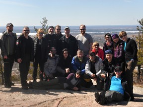 A group from the Ottawa region poses for a photo in Gatineau April 21 before leaving for their Mount Everest excursion in Nepal. (JONATHON BRODIE/Postmedia Network)