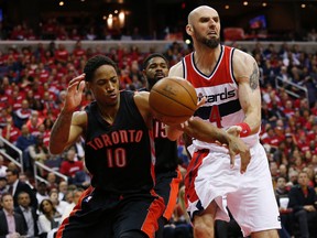 Raptors' DeMar DeRozan knocks the ball from Washington Wizards' Marcin Gortat during Game 3 at Verizon Center in Washington on Friday. (USA TODAY SPORTS/PHOTO)