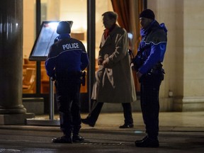 Swiss police. 

AFP PHOTO / FABRICE COFFRINI