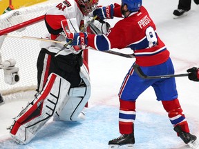Apr 24, 2015; Montreal, Quebec, CAN; Ottawa Senators goalie Craig Anderson (41) and Montreal Canadiens right wing Brandon Prust (8) fight during the third period in game five of the first round of the 2015 Stanley Cup Playoffs at Bell Centre. Mandatory Credit: Jean-Yves Ahern-USA TODAY Sports