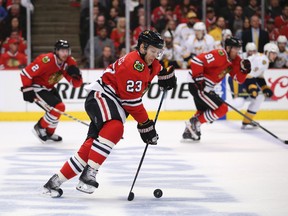 Chicago Blackhawks right wing Kris Versteeg (23) skates with the puck against the Nashville Predators during second period in game six of the first round of the 2015 Stanley Cup Playoffs at United Center.  Kamil Krzaczynski-USA TODAY Sports
