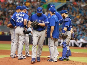 Toronto Blue Jays starting pitcher Mark Buehrle is taken out of the game during the sixth inning against the Tampa Bay Rays at Tropicana Field on April 26, 2015. (Kim Klement/USA TODAY Sports)