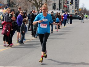 Gathe Nicholson wins first in the Limestone Race Weekend's women's division of the half-marathon. "And I'm 52, I'm proud of that," Gathe said after finishing. Steph Crosier, The Whig-Standard, Postmedia Network
