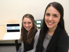 Meghan Plotnick, left, and Andrea Brennan are graduate students in kinesiology and health studies who are organizing a walk in which doctors and their patients can promote the need for more exercise and physical activity. (Michael Lea/The Whig-Standard)