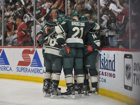 Minnesota Wild celebrate a goal by forward Justin Fontaine during the second period against the Saint Louis Blues  in Game 6 of the first round of the 2015 NHL playoffs at Xcel Energy Center on April 26, 2015. (Marilyn Indahl/USA TODAY Sports)