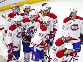 Apr 26, 2015; Ottawa, Ontario, CAN; Montreal Canadiens players celebrate as they won against Ottawa Senators in the game six of the first round of the 2015 Stanley Cup Playoffs at the Canadian Tire Centre. Mandatory Credit: Jean-Yves Ahern-USA TODAY Sports