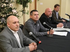 JOHN LAPPA/THE SUDBURY STAR/QMI AGENCY
Mitch Medina, left, lead negotiator for Vale, Kelly Strong, vice-president of Ontario/UK Operations of Vale, Rick Bertrand, president of Local 6500 of the United Steelworkers, and Myles Sullivan, USW staff representative, take part in a joint news conference at the Steelworkers hall in this file photo.