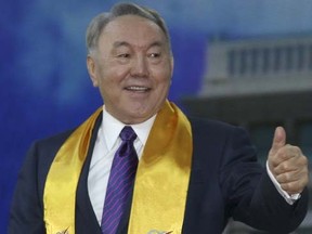 Kazakhstan's President Nursultan Nazarbayev, who was re-elected, gestures during a post-election rally in Astana April 27, 2015.   REUTERS/Mukhtar Kholdorbekov