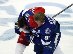 Tampa Bay Lightning centre Steven Stamkos and Detroit Red Wings defenceman Kyle Quincey fight during the first period in Game 2 of the first round of the 2015 NHL playoffs at Amalie Arena on April 18, 2015. (Kim Klement/USA TODAY Sports)