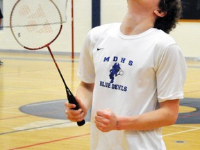 Frankie Binns of the MDHS junior badminton team reacts after a failed shot during a recent match at the Mitchell DHS Blue Devil tournament. ANDY BADER/MITCHELL ADVOCATE