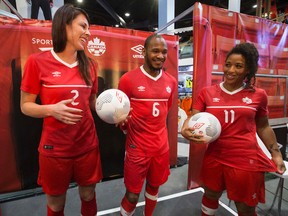 Desiree Scott (right), will wear Canadian colours at the Women's World Cup of soccer, which will be held in Canada in June.