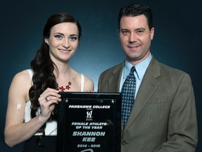 Sarnia's Shannon Kee, 22, was named Fanshawe College's female athlete of the year. Nathan McFadden, the school's manager of athletics, presented the award to Kee, who skipped the women's curling team to provincial and national gold medals.  Handout/Sarnia Observer/Postmedia Network