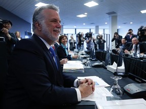 Quebec Premier Philippe Couillard waits for the start of a meeting of provincial and territorial premiers in Ottawa January 30, 2015. REUTERS/Chris Wattie