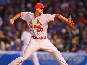 St. Louis Cardinals pitcher Adam Wainwright throws during the first inning against the Chicago Cubs at Wrigley Field. (Dennis Wierzbicki/USA TODAY Sports)