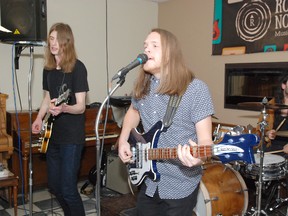 Postmedia image
Taylor Knox, left, and his band.