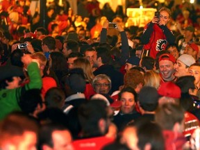 The Red Mile was back along 17ave. S.W. after the Flames eliminated the Canucks in round 1 in Calgary, Alta. on Saturday April 25, 2015. Darren Makowichuk/Calgary Sun/Postmedia Network