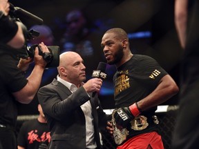 Joe Rogan interviews Jon Jones after the UFC light heavy weight championship fight against Glover Teixeria at Baltimore Arena. Jones retained the light heavy height championship by defeating Teixeria. (Tommy Gilligan-USA TODAY Sports)