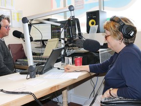 BRUCE BELL/STAFF REPORTER
County FM 99.3 on-air personality JJ Johnson and station general manager Deb Simpson discuss the station's upcoming Radiothon to raise funds for emergency generators for their studio and transmitter sites. The Radiothon will run for the entire month of May.