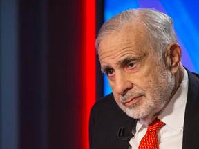 Billionaire activist-investor Carl Icahn gives an interview on FOX Business Network's Neil Cavuto show in New York in this February 11, 2014 file photo. (REUTERS/Brendan McDermid/Files)