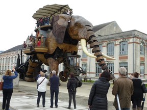 Part of a project called Les Machines de Ile, this giant mechanical elephant takes visitors for a slow spin around a former industrial island in Nantes. ROBIN ROBINSON/TORONTO SUN