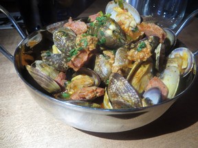 Black Pearl’s fresh clams in a tomato/sausage broth