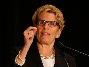 Ontario Premier Kathleen Wynne speaks at the Metro Toronto Convention Centre at the CivicAction Summit 2015 - Better City Bootcamp on Tuesday, April 28, 2015. (Jack Boland/Toronto Sun)