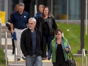 Victims and family members of victims leave Arapahoe County District Court in Centennial, Colorado April 27, 2015. Colorado's long-awaited cinema massacre trial began on Monday with opening statements in which jurors were asked to decide whether gunman James Holmes was insane when he killed a dozen moviegoers in 2012, or a calculating mass murderer who deserves execution. Holmes pleaded not guilty by reason of insanity to multiple charges of murder and attempted murder for opening fire inside a midnight screening of a "Batman" movie at a Denver-area multiplex in July 2012. Twelve people were killed and another 70 were wounded in the shooting. REUTERS/Evan Semon