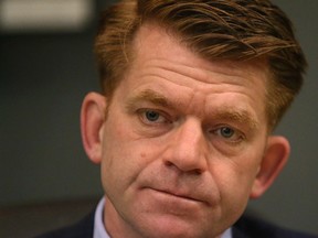 Wildrose Leader Brian Jean pauses between answers questions during an editorial board meeting at the Edmonton Sun on Tuesday April 28, 2015. Tom Braid/Edmonton Sun