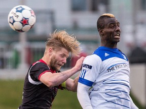 Edmonton's Lance Laing, right, was involved in a sideline situation last Wednesday in Ottawa (Errol McGihon, Postmedia Network).