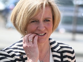 Alberta NDP leader Rachel Notley gestures as she leaves during a campaign stop in southeast Calgary, Alta on Tuesday April 28, 2015. Albertans go to the polls on May 5, 2015.
Jim Wells/Calgary Sun/Postmedia Network
