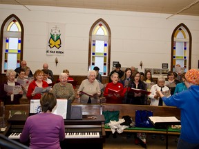 Members of the La Chorale Communautaire de Cochrane Community Choir practice at the United Church in preparation for their upcoming presentation of The Magic of Disney. The concert will take place on May 7th at the Transfiguration Church.